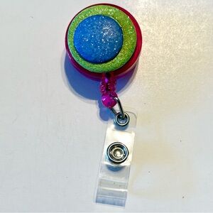 Retractable badge holder